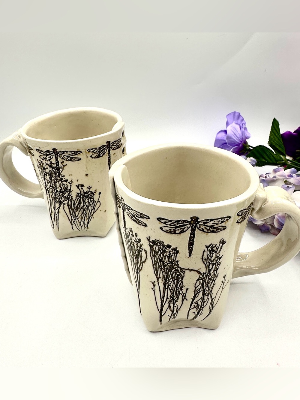 2 Mugs signed by the Artist Colleen. Wrapped clay with pressed flowers.